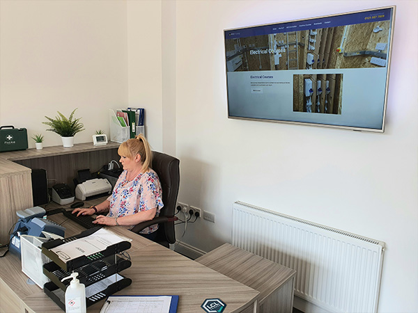 office-feature Lady working at her desk