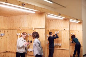 electrical training class of men and women